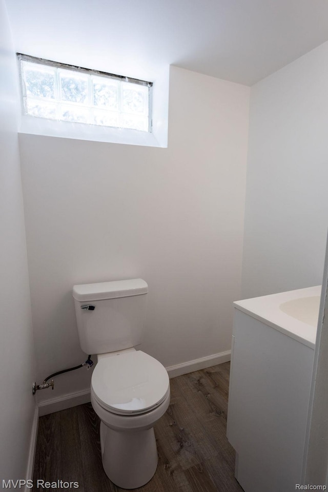 21212 Universal Ave, Eastpointe, MI 48021 - bathroom with vanity, wood finished floors, and plenty of natural light