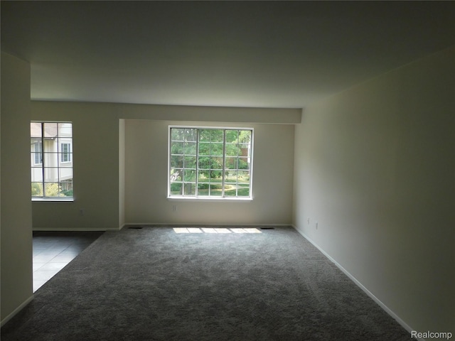 30268 Southfield Rd Unit 229, Southfield, MI 48076 - carpeted empty room with plenty of natural light