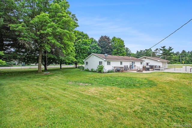 8406 W Ellis Rd, Davisburg, MI 48350 - view of yard with a wooden deck