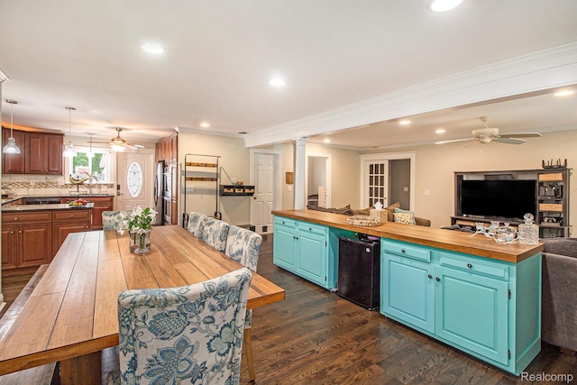 8406 W Ellis Rd, Davisburg, MI 48350 - kitchen with ceiling fan, wooden counters, open floor plan, ornamental molding, and recessed lighting