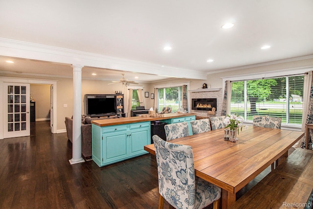 8406 W Ellis Rd, Davisburg, MI 48350 - dining space featuring dark wood-style floors, ornamental molding, a glass covered fireplace, recessed lighting, and ceiling fan