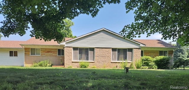 8406 W Ellis Rd, Davisburg, MI 48350 - single story home featuring a front yard and brick siding
