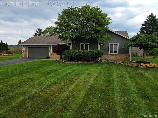 1640 High Pointe Dr, Commerce Twp, MI 48390 - view of front of property with brick siding, a front lawn, asphalt driveway, and an attached garage