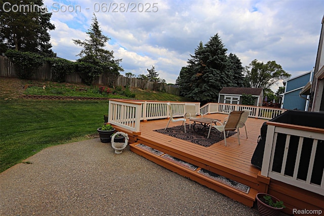 1640 High Pointe Dr, Commerce Twp, MI 48390 - deck featuring a fenced backyard and a storage unit