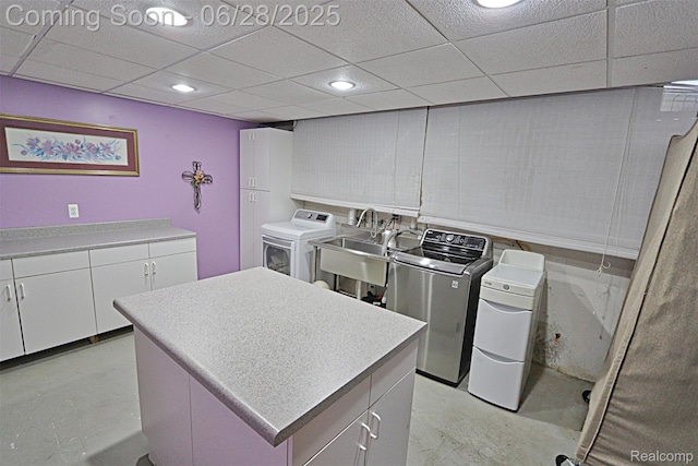 1640 High Pointe Dr, Commerce Twp, MI 48390 - laundry area with separate washer and dryer, cabinet space, and recessed lighting
