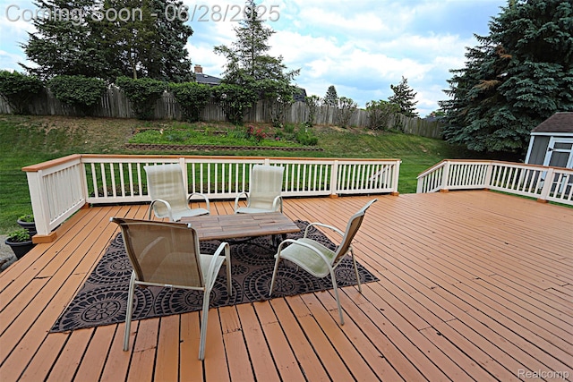 1640 High Pointe Dr, Commerce Twp, MI 48390 - wooden terrace with a fenced backyard and outdoor dining area