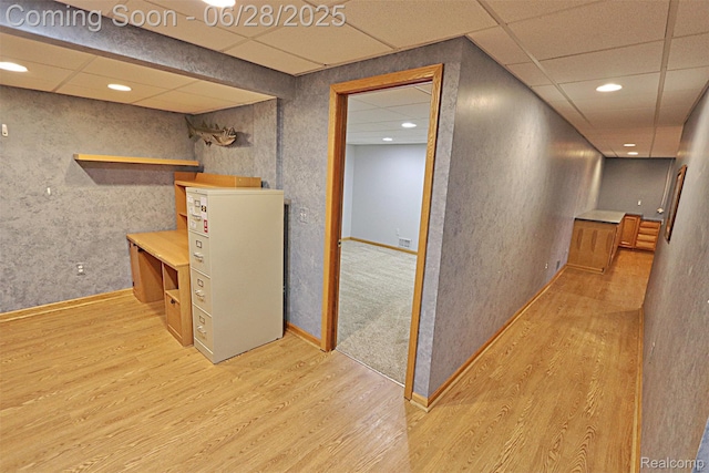 1640 High Pointe Dr, Commerce Twp, MI 48390 - hall with light wood-type flooring, a drop ceiling, and recessed lighting