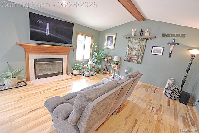 1640 High Pointe Dr, Commerce Twp, MI 48390 - living room featuring wood finished floors and a premium fireplace