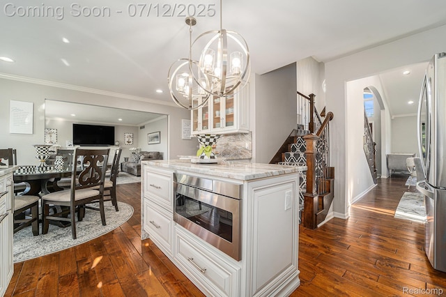 7590 Acorn Hill Ct, West Bloomfield, MI 48323 - kitchen featuring built in microwave, freestanding refrigerator, ornamental molding, glass insert cabinets, and dark wood-style flooring