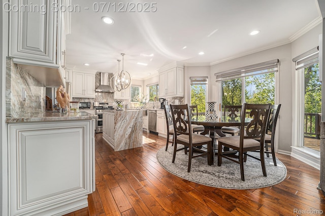 7590 Acorn Hill Ct, West Bloomfield, MI 48323 - dining area with dark wood-style floors, a chandelier, healthy amount of natural light, recessed lighting, and crown molding
