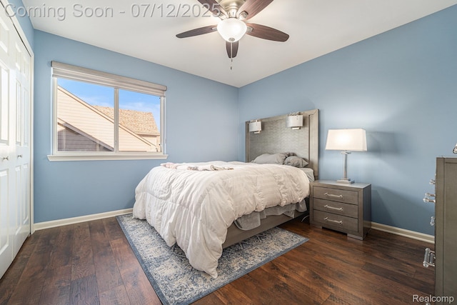 7590 Acorn Hill Ct, West Bloomfield, MI 48323 - bedroom with dark wood-style flooring, a closet, and a ceiling fan