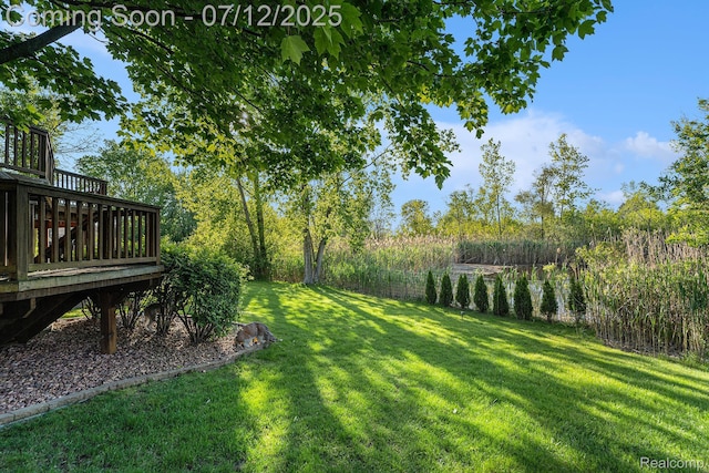 7590 Acorn Hill Ct, West Bloomfield, MI 48323 - view of green lawn with a deck