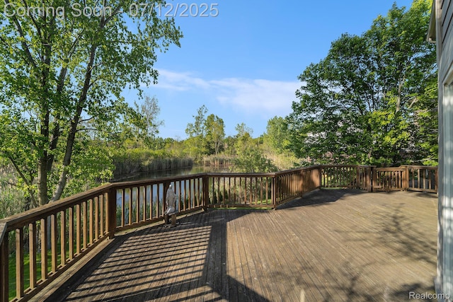 7590 Acorn Hill Ct, West Bloomfield, MI 48323 - wooden terrace with a water view