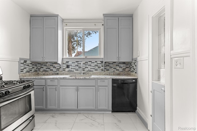 1518 Austin Ave, Lincoln Park, MI 48146 - kitchen with dishwasher, gray cabinetry, and stainless steel gas stove