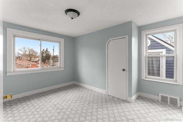 1518 Austin Ave, Lincoln Park, MI 48146 - carpeted spare room featuring healthy amount of natural light