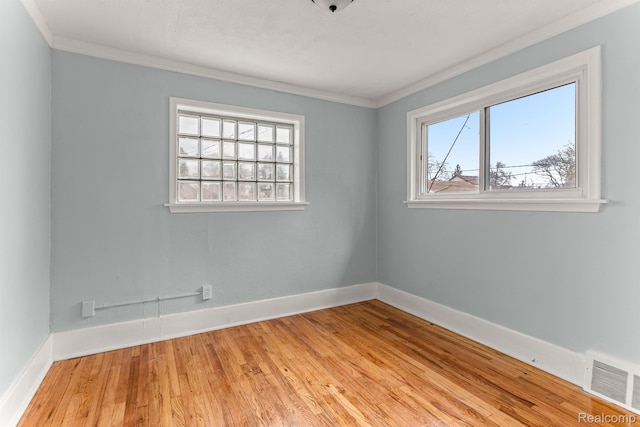 1518 Austin Ave, Lincoln Park, MI 48146 - spare room featuring ornamental molding and wood finished floors