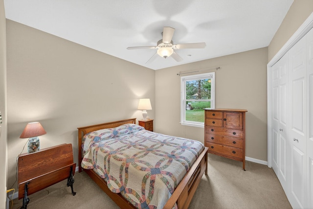 70749 Sunset Blvd, Union, MI 49130 - bedroom with light colored carpet, a closet, and ceiling fan