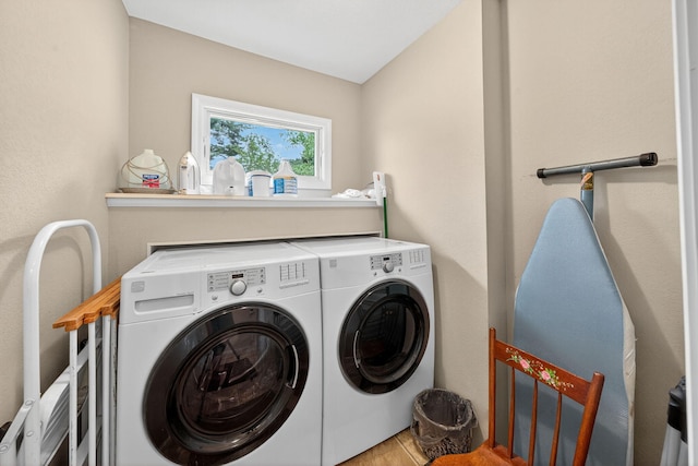 70749 Sunset Blvd, Union, MI 49130 - laundry area with washing machine and dryer and wood finished floors