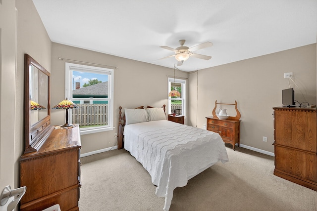 70749 Sunset Blvd, Union, MI 49130 - bedroom featuring multiple windows, light carpet, and ceiling fan