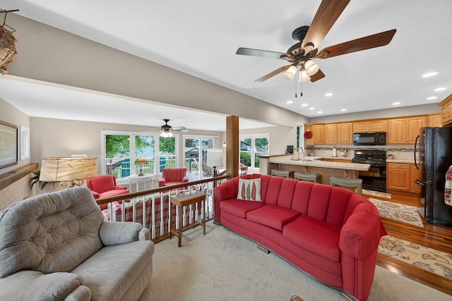 70749 Sunset Blvd, Union, MI 49130 - living area with ceiling fan, recessed lighting, and light wood-type flooring