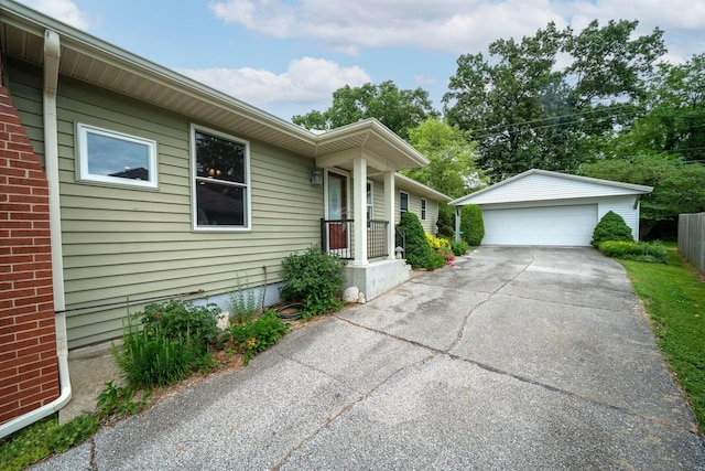 70749 Sunset Blvd, Union, MI 49130 - view of property exterior featuring a detached garage and an outbuilding