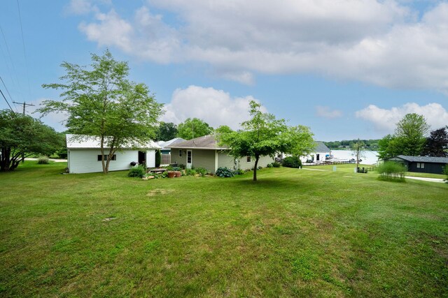 70749 Sunset Blvd, Union, MI 49130 - view of green lawn with a water view
