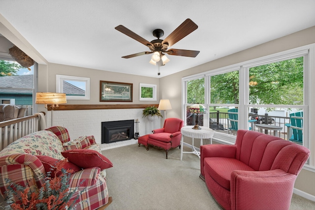 70749 Sunset Blvd, Union, MI 49130 - carpeted living area with a fireplace and a ceiling fan