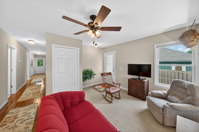 70749 Sunset Blvd, Union, MI 49130 - living area featuring ceiling fan, plenty of natural light, and wood finished floors