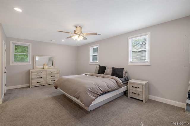6590 Swartout Rd, Clay, MI 48001 - bedroom with light colored carpet, recessed lighting, and ceiling fan
