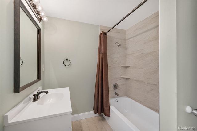 6590 Swartout Rd, Clay, MI 48001 - full bath featuring vanity, shower / bath combo, and wood finished floors