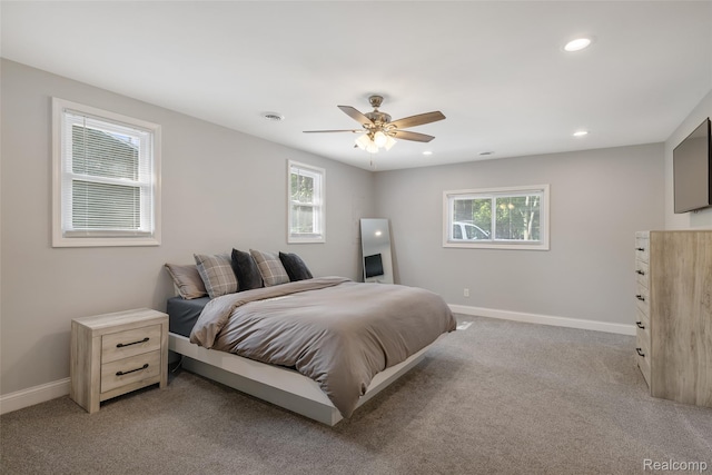 6590 Swartout Rd, Clay, MI 48001 - bedroom featuring multiple windows, light carpet, recessed lighting, and ceiling fan