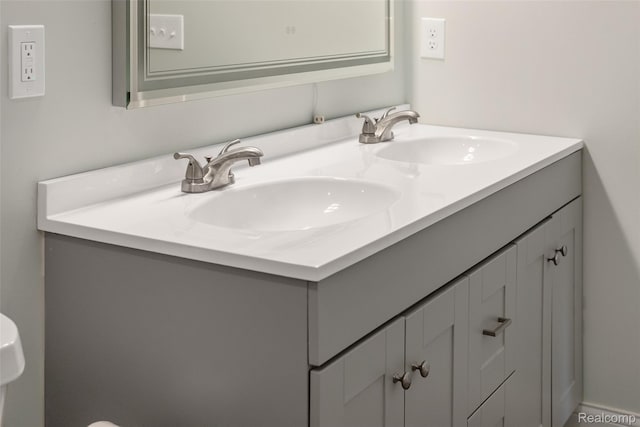 6590 Swartout Rd, Clay, MI 48001 - bathroom featuring double vanity