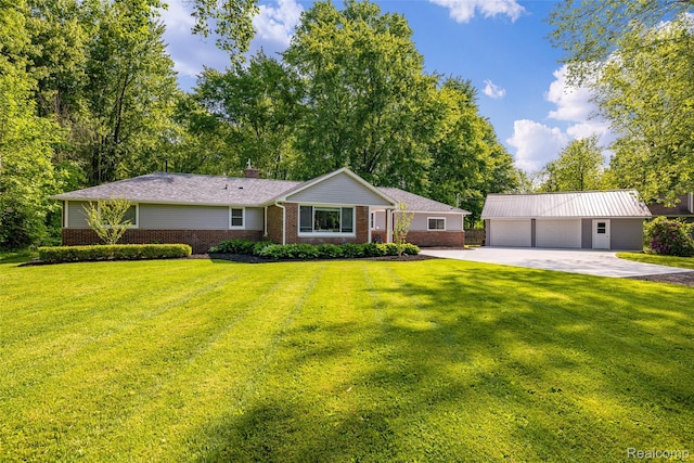 6590 Swartout Rd, Clay, MI 48001 - ranch-style house with brick siding, an outdoor structure, a garage, and a front yard