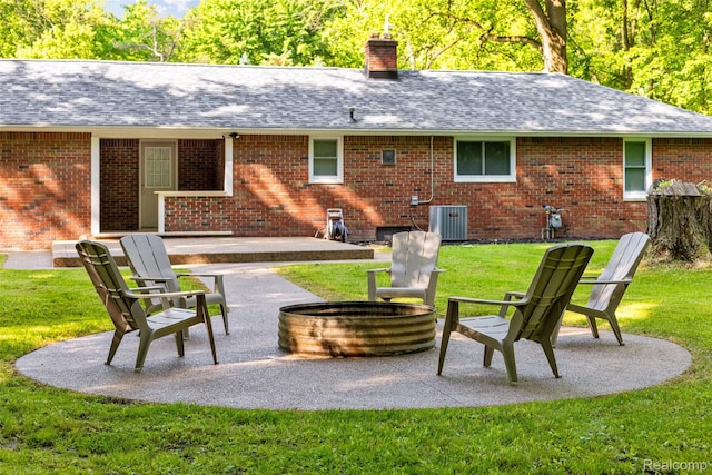 6590 Swartout Rd, Clay, MI 48001 - view of patio / terrace featuring an outdoor fire pit
