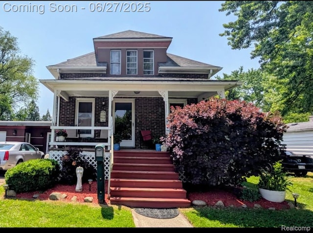 23700 Allor St, Saint Clair Shores, MI 48082 - view of front facade featuring a porch, brick siding, and a shingled roof