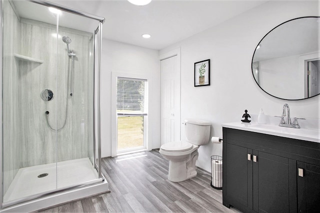 20020 T Dr S, Tekonsha, MI 49092 - full bathroom with vanity, a stall shower, wood finished floors, and recessed lighting