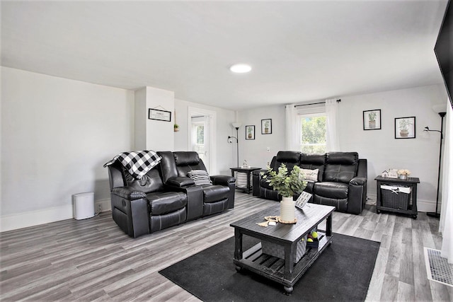 20020 T Dr S, Tekonsha, MI 49092 - living area featuring light wood-style flooring and baseboards