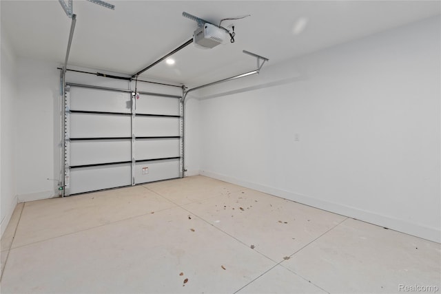 5226 Avery St Unit 5, Detroit, MI 48208 - garage with a garage door opener and baseboards