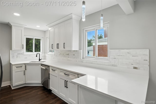 1418 W 13 Mile Rd, Royal Oak, MI 48073 - kitchen featuring dishwasher, decorative backsplash, white cabinets, dark wood-style floors, and light countertops