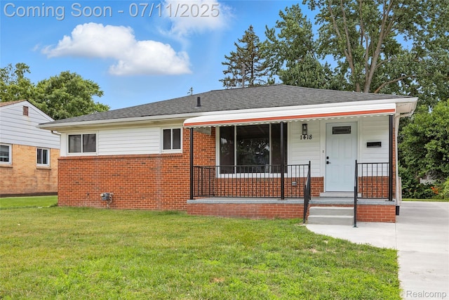 1418 W 13 Mile Rd, Royal Oak, MI 48073 - bungalow featuring a front lawn, brick siding, covered porch, and a shingled roof