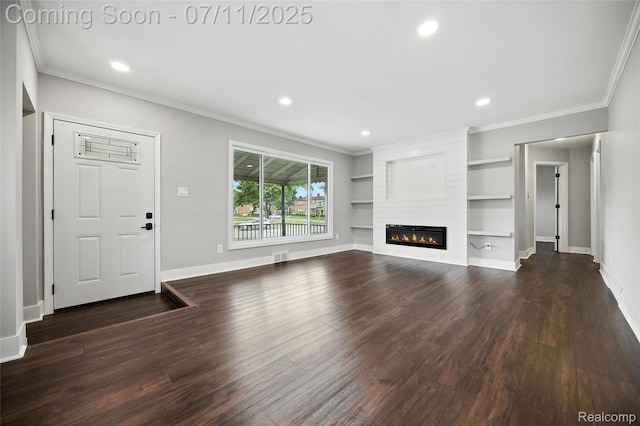 1418 W 13 Mile Rd, Royal Oak, MI 48073 - unfurnished living room with crown molding, dark wood-type flooring, a large fireplace, recessed lighting, and built in shelves