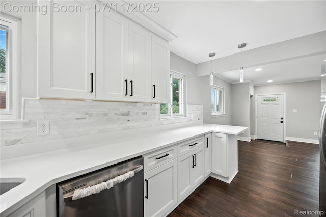 1418 W 13 Mile Rd, Royal Oak, MI 48073 - kitchen featuring stainless steel dishwasher, decorative backsplash, white cabinets, hanging light fixtures, and light countertops
