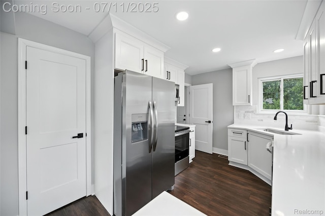 1418 W 13 Mile Rd, Royal Oak, MI 48073 - kitchen with stainless steel appliances, dark wood-style flooring, white cabinetry, and recessed lighting