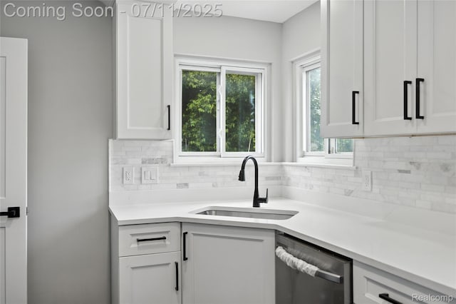 1418 W 13 Mile Rd, Royal Oak, MI 48073 - kitchen featuring dishwasher, backsplash, light countertops, and white cabinetry