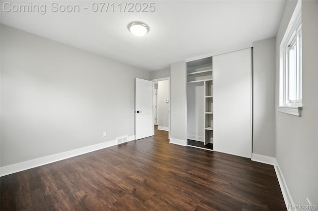 1418 W 13 Mile Rd, Royal Oak, MI 48073 - unfurnished bedroom with dark wood finished floors and a closet