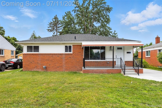 1418 W 13 Mile Rd, Royal Oak, MI 48073 - bungalow with brick siding, a front lawn, and covered porch