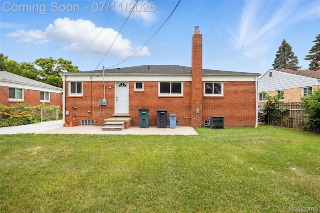 1418 W 13 Mile Rd, Royal Oak, MI 48073 - rear view of house with a chimney, a patio, and brick siding