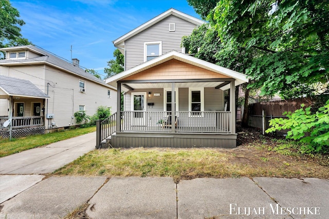 243 Page St NE, Grand Rapids, MI 49505 - view of front of property featuring a porch