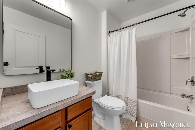 243 Page St NE, Grand Rapids, MI 49505 - bathroom featuring vanity, shower / bath combo with shower curtain, and tile patterned floors