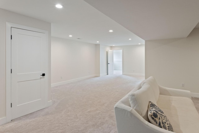 6581 Timpson Ave SE, Alto, MI 49302 - below grade area with light colored carpet and recessed lighting